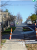 A view looking east on South Street showing curb work in the distance