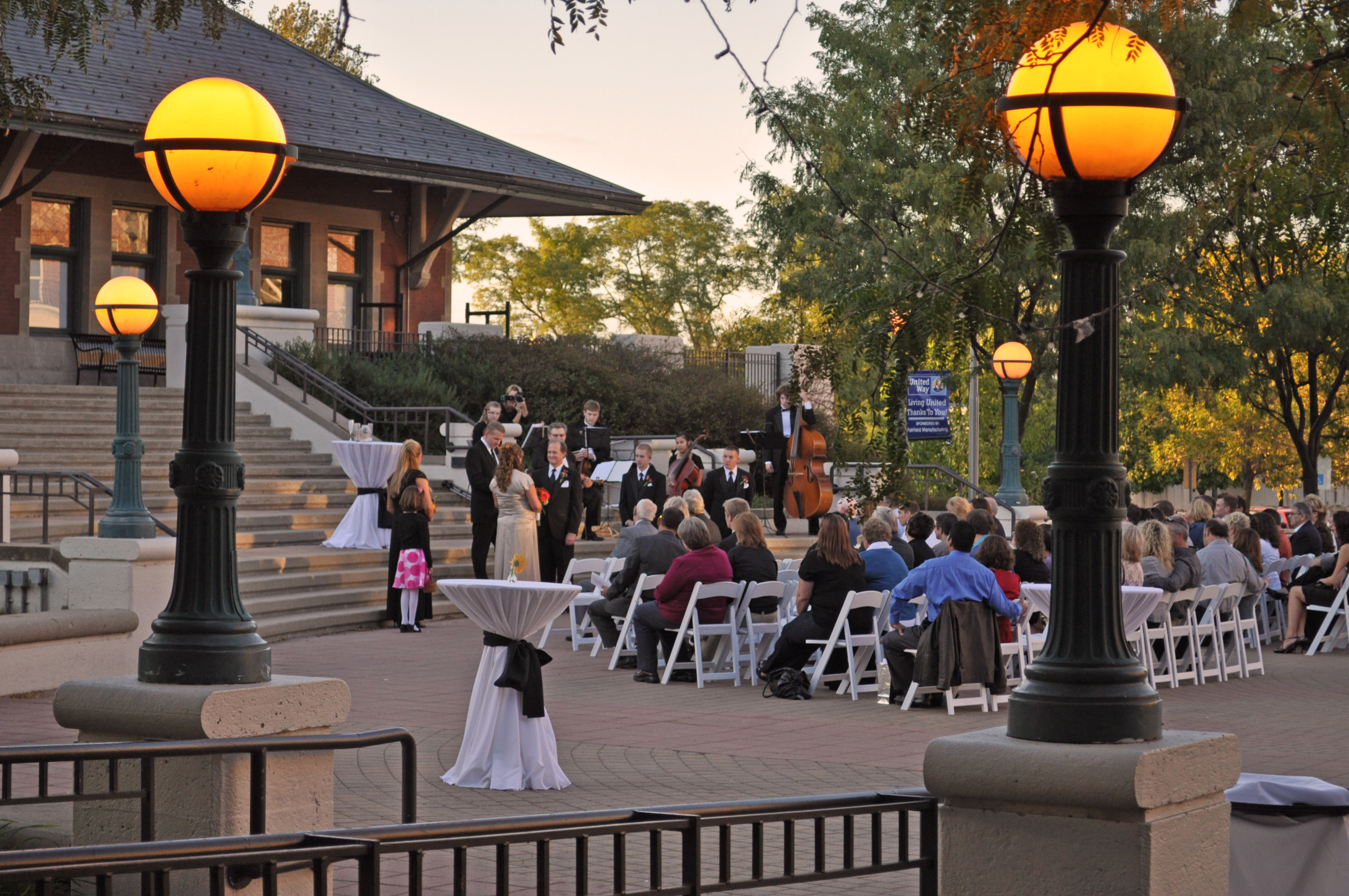 An event outside at the bottom of the step of the depot